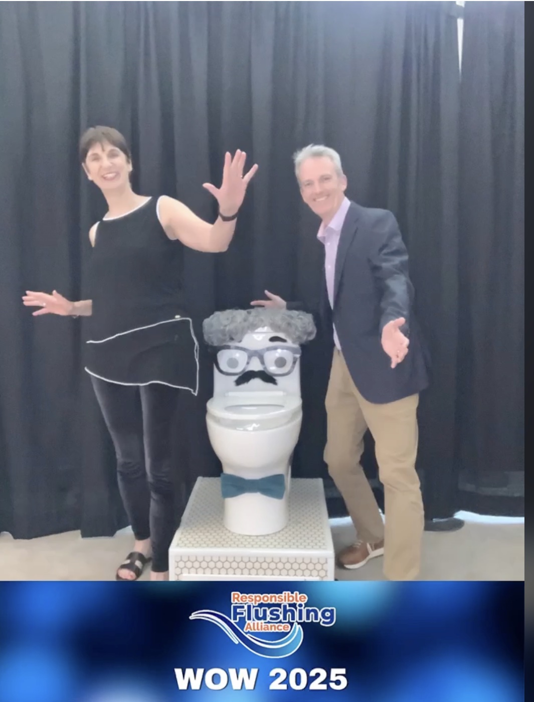 Heidi Beatty and Paul Davies with Mel the talking toilet at World of Wipes 2025